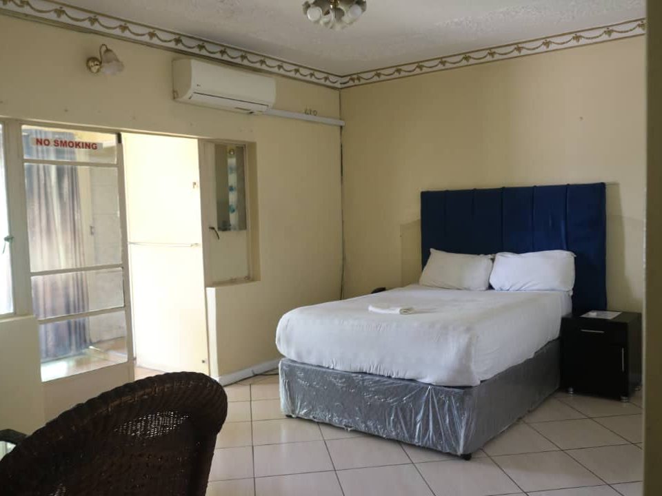 Premium double room with air conditioning at Afro Lodges & Motels, Borrowdale, Harare