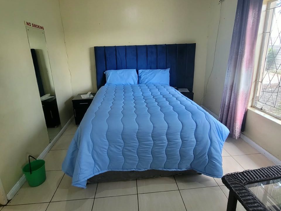 Premium double room with garden window at Afro Lodges & Motels, Borrowdale, Harare