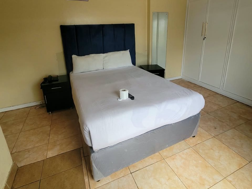 Premium double room with built-in wardrobe at Afro Lodges & Motels, Borrowdale, Harare